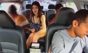 كاميرا سرية تضبط شابة أميركية تسرق من سائق تاكسي ” اوبر “