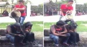 أندونيسيا : قرويون يعاقبون شاباً و فتاة بصب مياه المجاري عليهما ! ( فيديو )