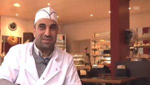من دمشق إلى سويسرا .. قصة صانع حلويات سوري ( فيديو )