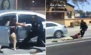 شرطي أمريكي ” يسحل ” امرأة في الشارع ! ( فيديو )