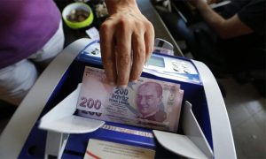 بسبب خسائر الليرة التركية .. بنك ” الإمارات دبي الوطني ” يوفر نحو 400 مليون دولار في أكبر استحواذ خارجي ينفذه على الإطلاق