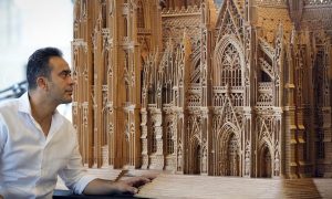 فرانس برس: لاجئ سوري يبدع في تصميم نسخة خشبية من كاتدرائية كولونيا الشهيرة ( فيديو )